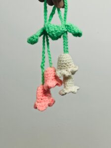 handmade rose and white colored bell flower crochet for keychain