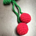 handmade reddish cherry crochet with green leaf crochetted for keychain