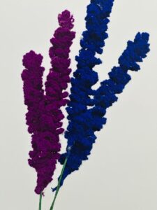 handmade dark blue and lavender colored lavender flower.contact hooked stories